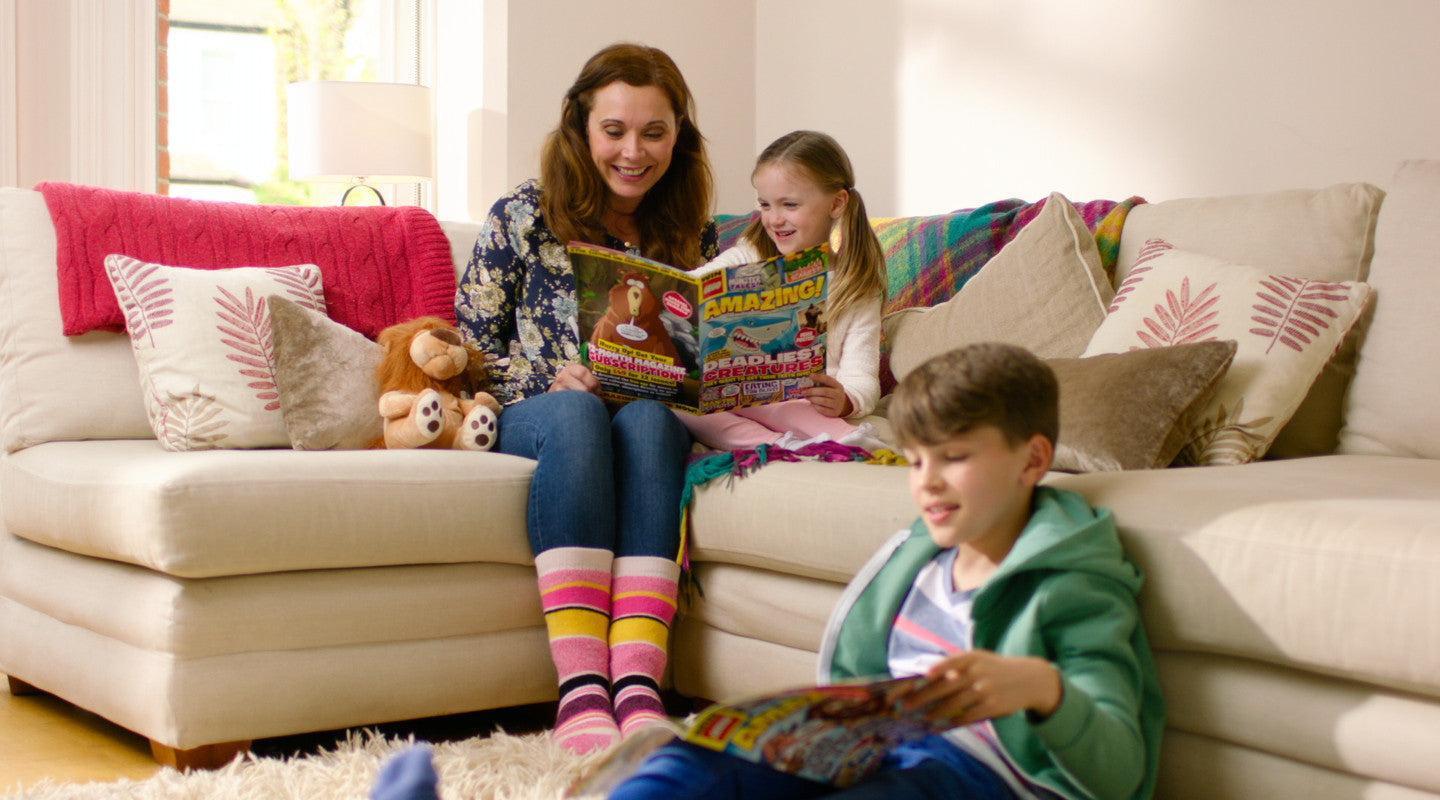 children reading amazing magazine